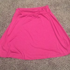 Hot pink athletic skirt.